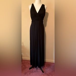 NWT. IMAN black maxi dress, sz. M. Open to reasonable offers. :-).